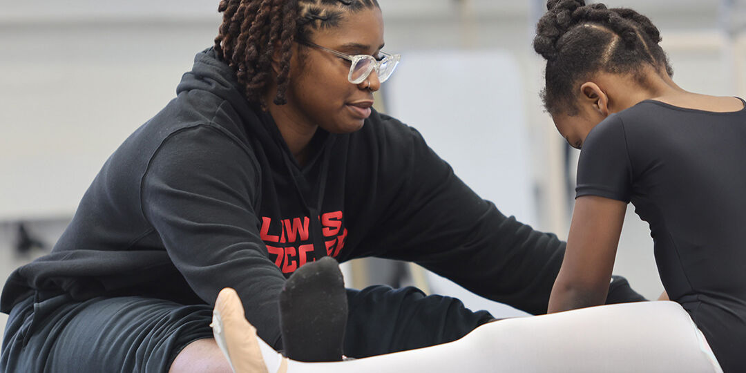 Ms Mikayla Teaching Helping A Student Creative Movement